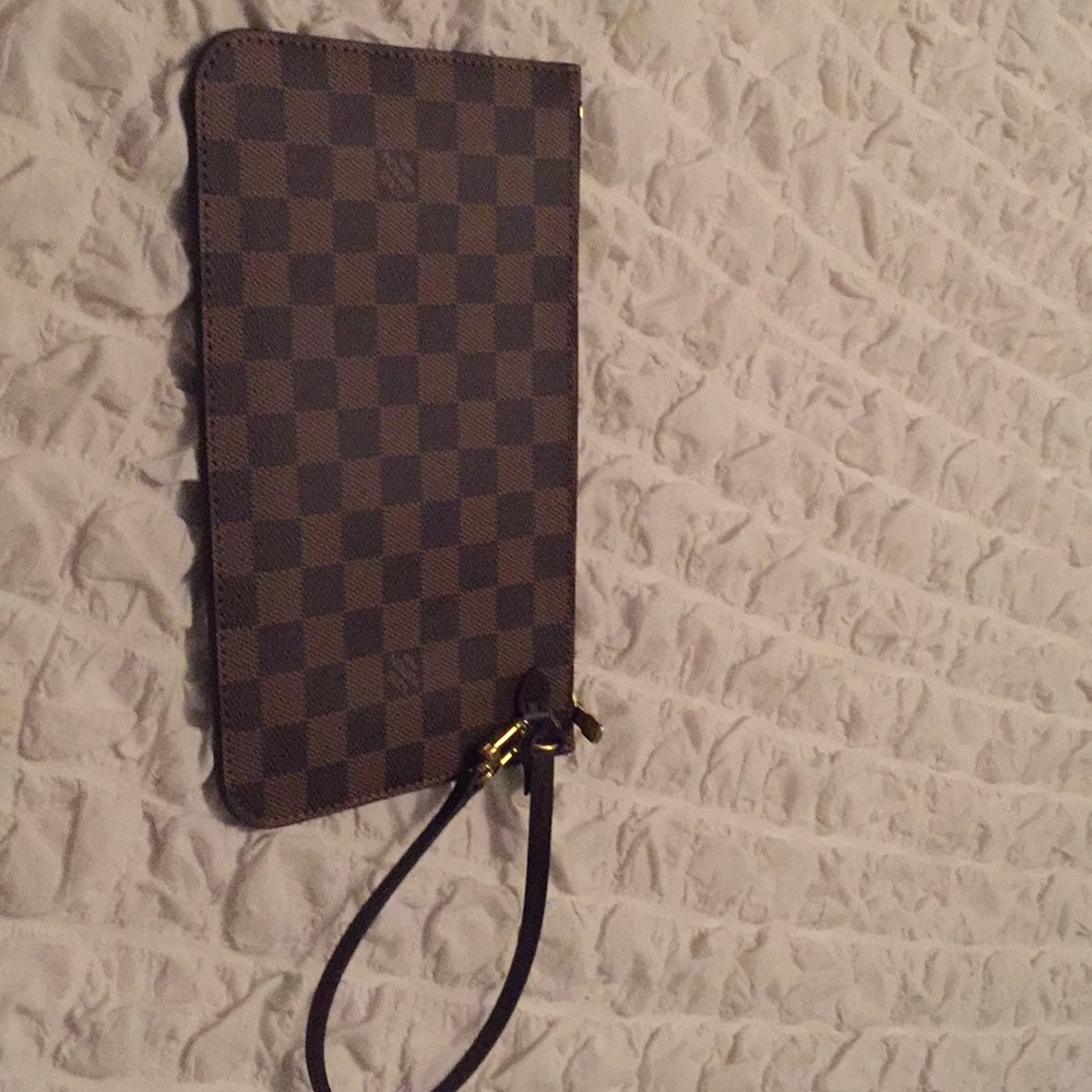 Never full wristlet brand new